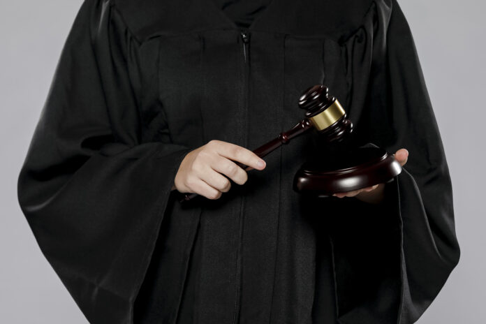 front-view-female-judge-with-gavel